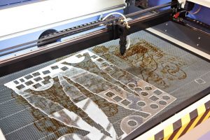laser cutting acrylic machine close up process