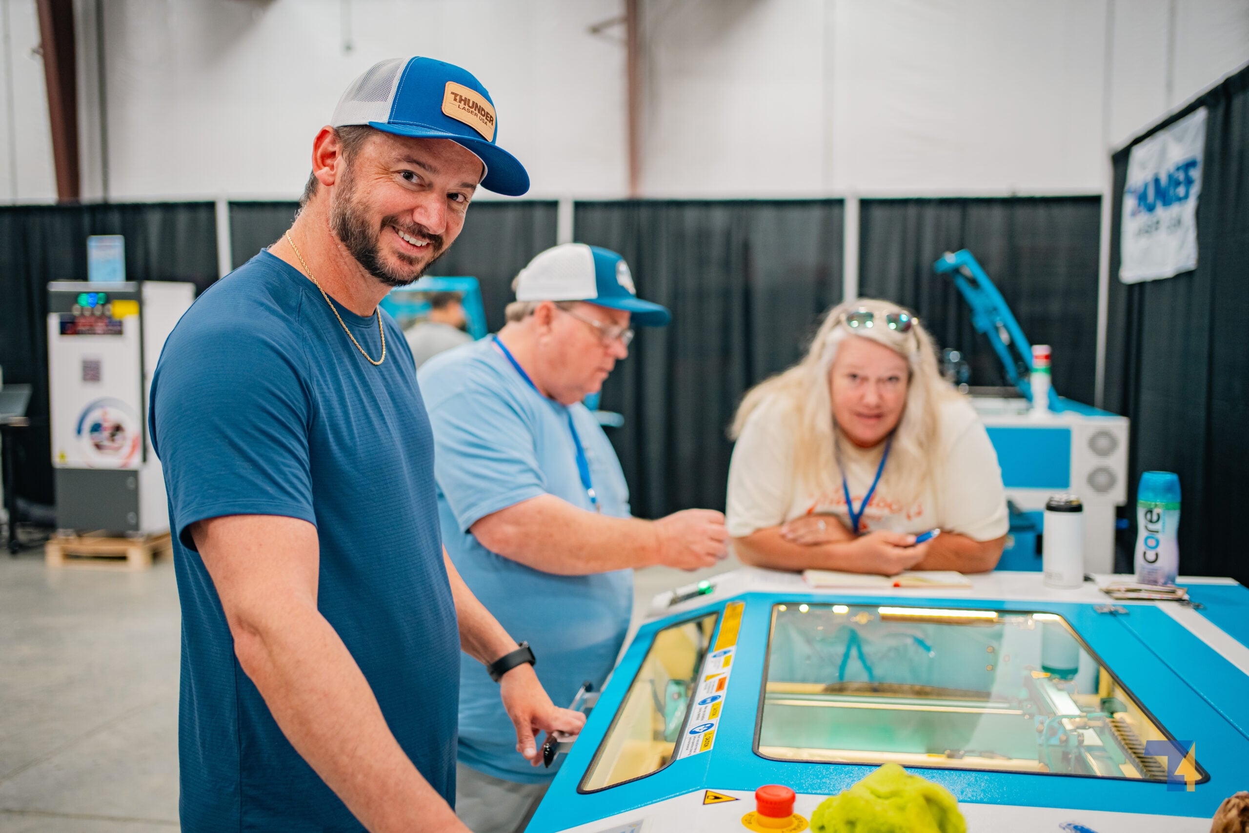The Thunder Laser team working with customers
